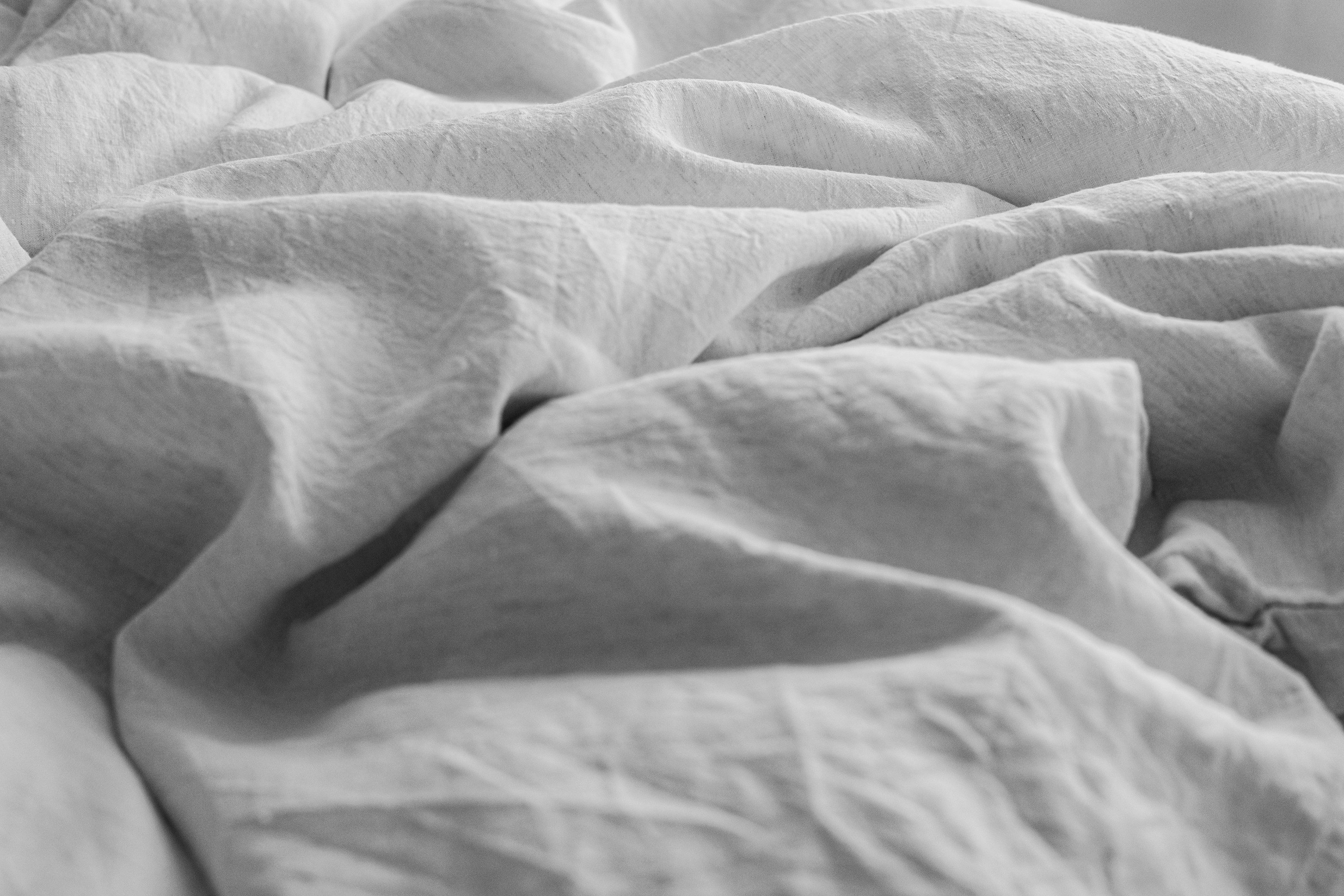 Fresh clean folded towels and bed linen